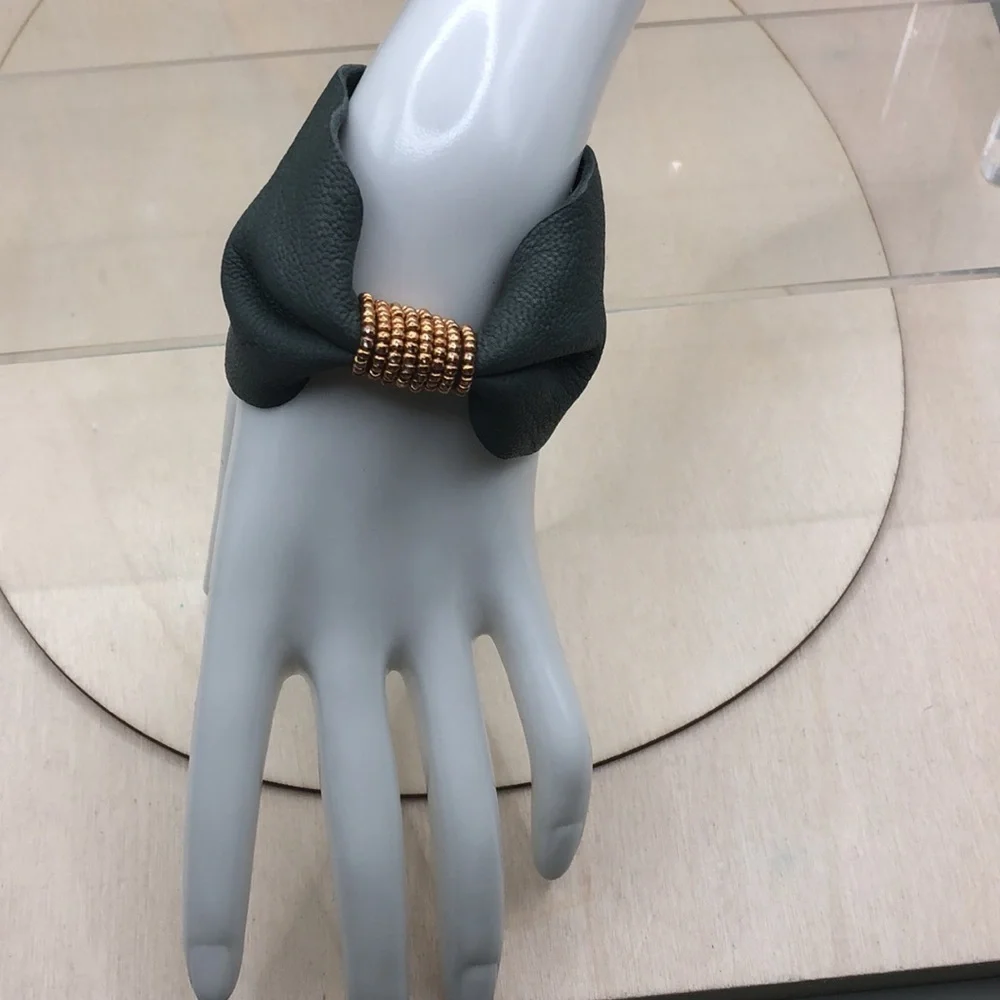 Soft leather bow shaped bracelet.